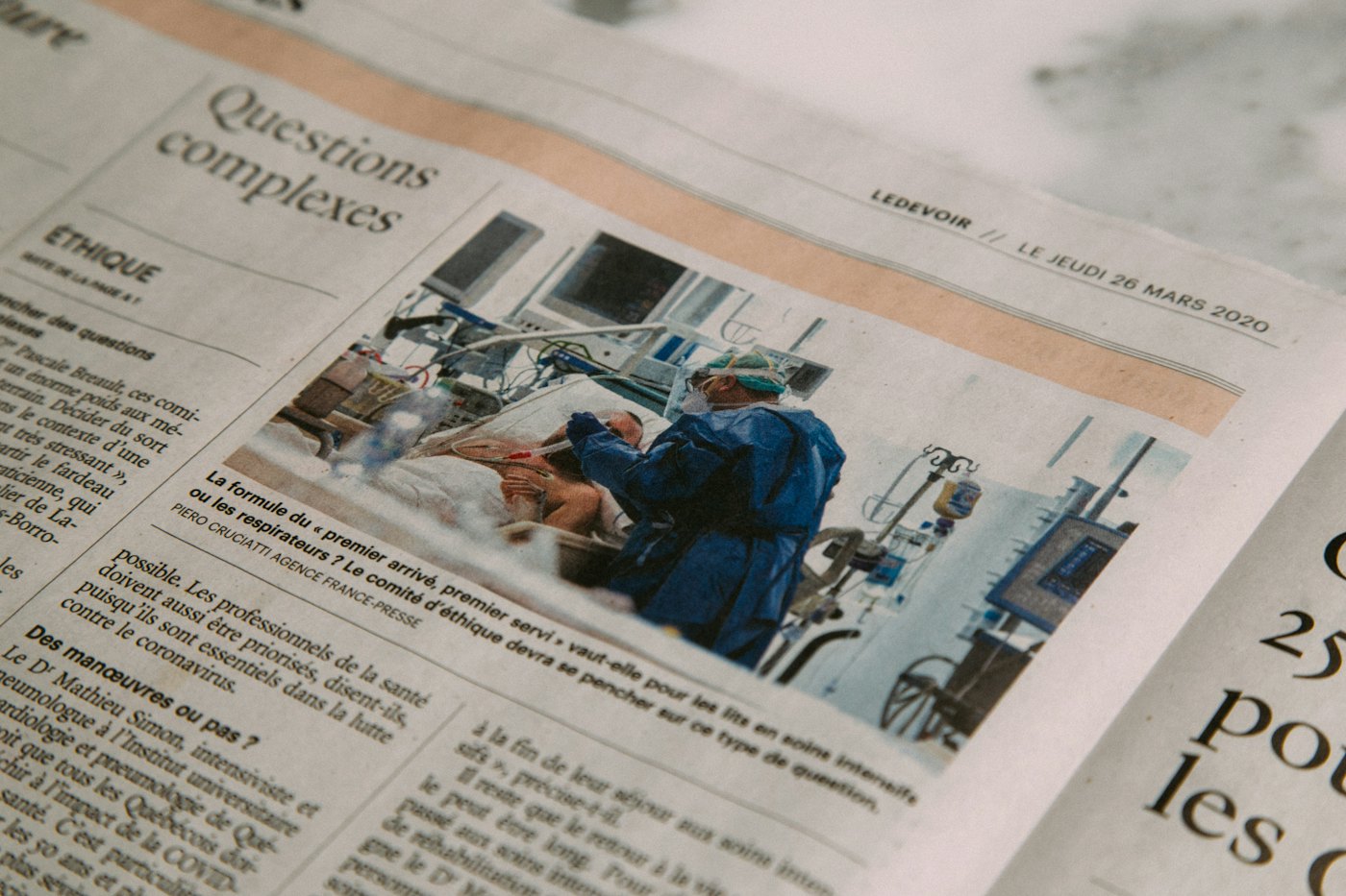 Close-up of a printed newspaper article highlighting a single story region